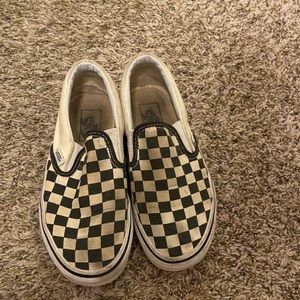 Checkered vans.